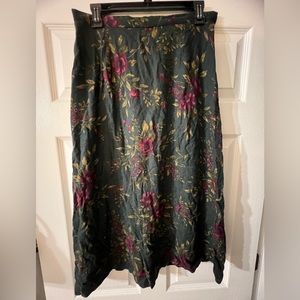 Dark green flowy midi skirt w/ red/tan floral design. Size L